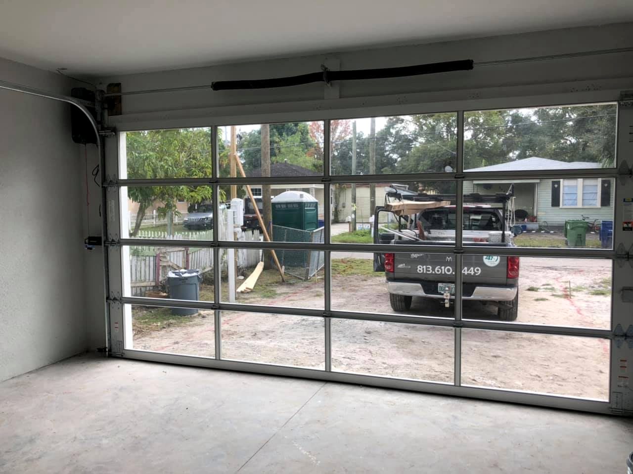 Garage door tracks and rollers